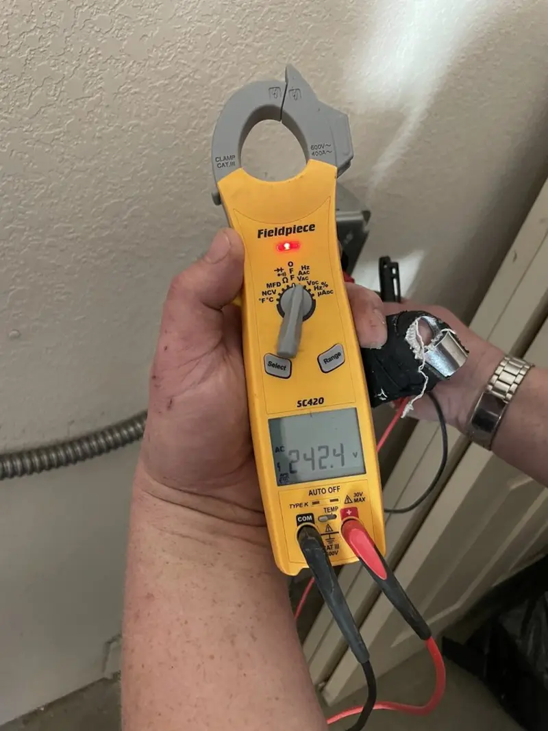 Voltage testing with clamp meter during Generator Installation in Grand Saline